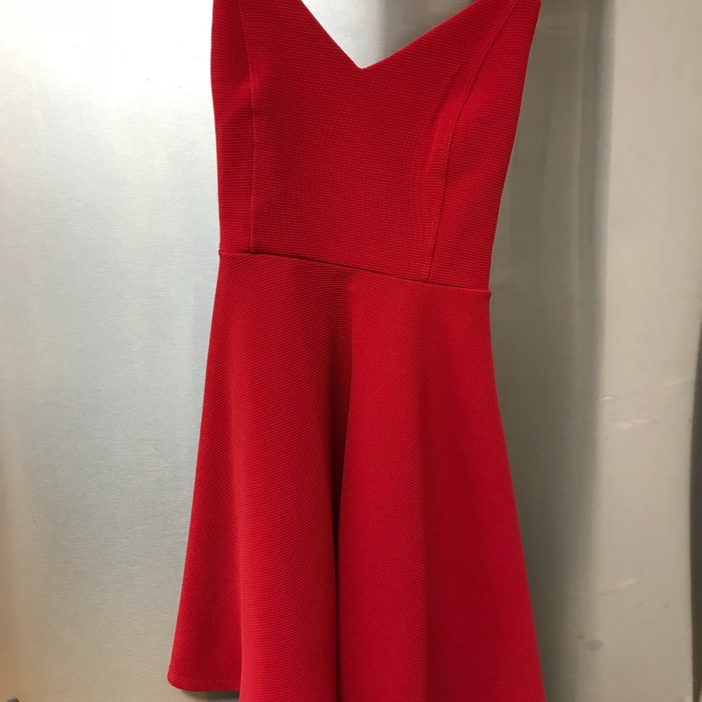 🦋4 for $15🦋 Cute red dress with cross straps. Size S